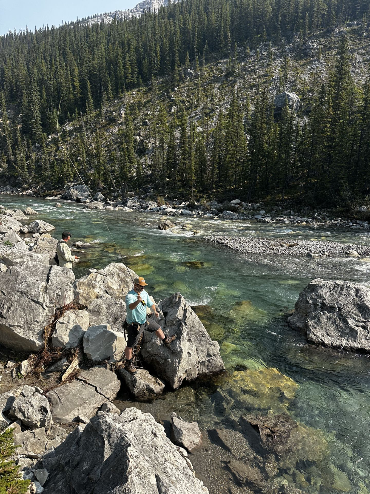 How do you stay safe fly fishing on Alberta rivers?